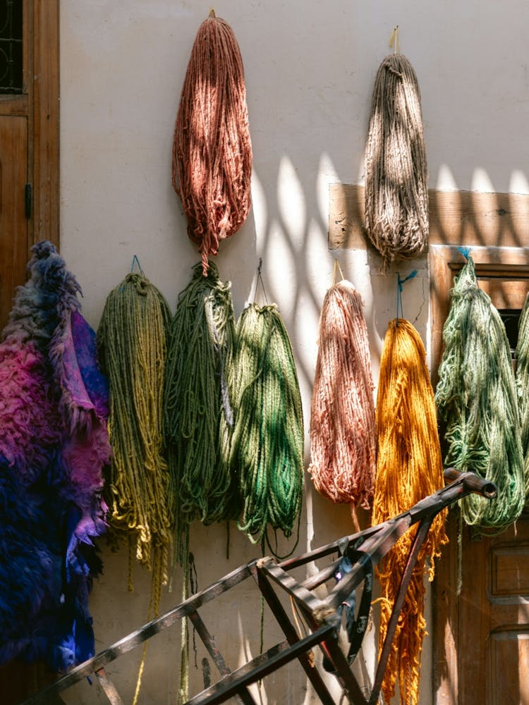 Yarn Hanging On A Wall in Fes, Morocco | Colorful travel photography