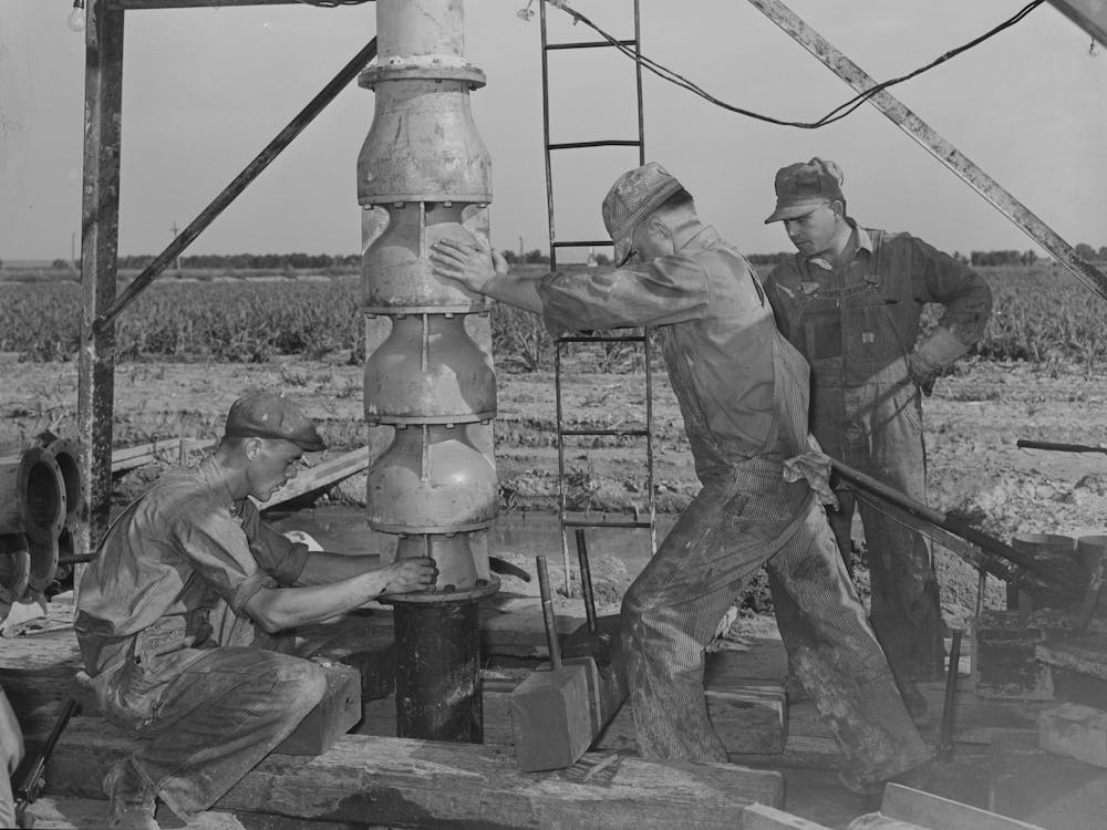 Getting Ready To Put In The Pumping Part Of The Water Well For Irrigation Purposes On A Farm Near Garden City, Kansas By