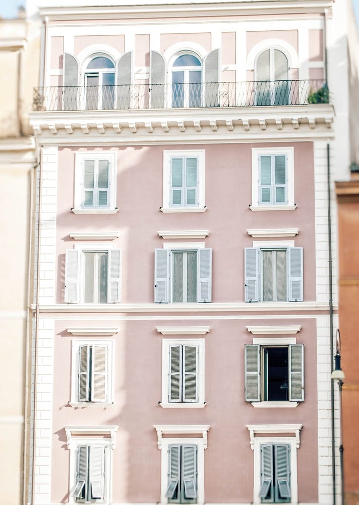 Pink Building In Rome with blue shutters