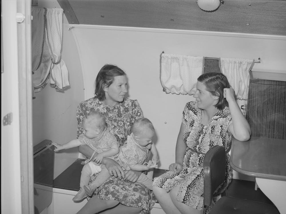 Wives And Children Of Farm Workers In The Trailer Clinic At The Fsa (Farm Security Administration) Migratory Labor