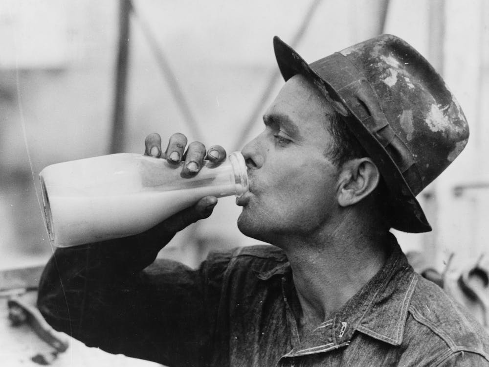 Oil Field Worker Drinking A Bottle Of Milk At Lunch, Kilgore, Texas By Russell Lee