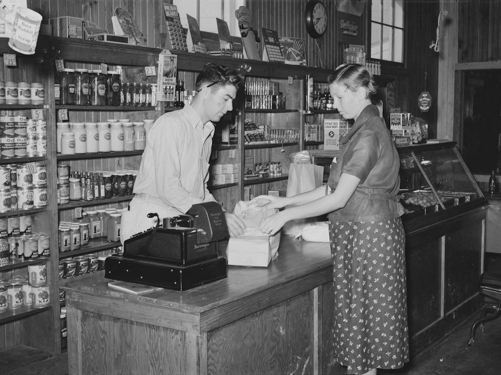 Making A Purchase In Cooperative Stores, Lake Dick Project, Arkansas By Russell Lee