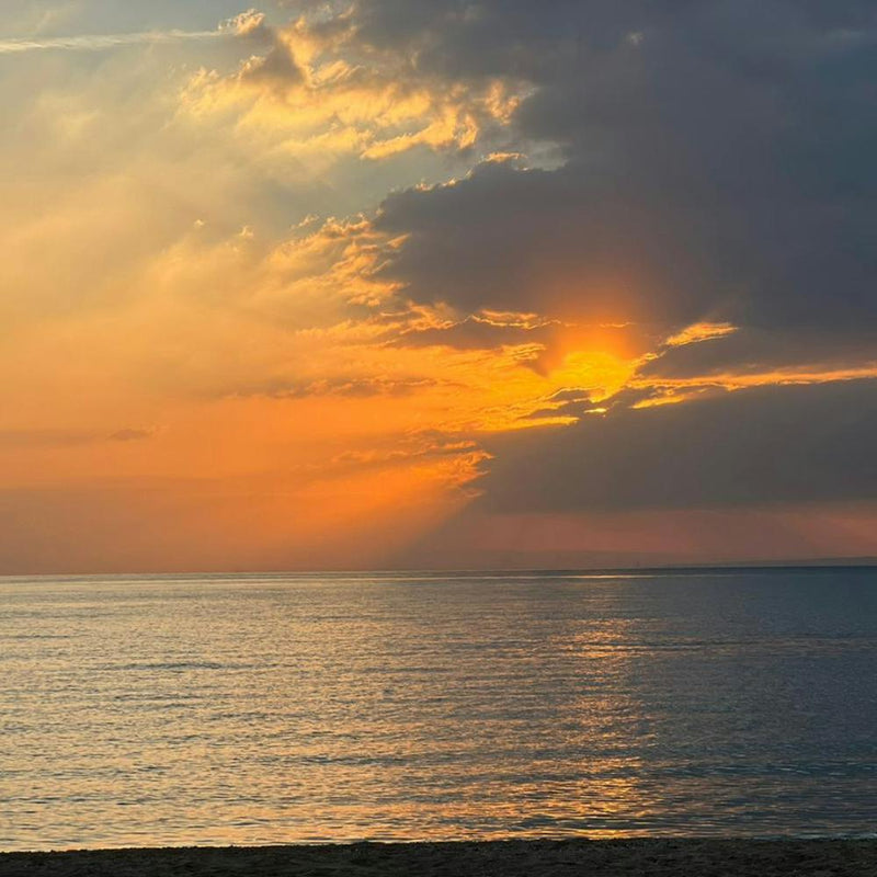 Sunset Over The Sea