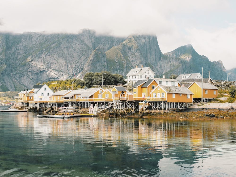 Yellow Buildings On Fjord