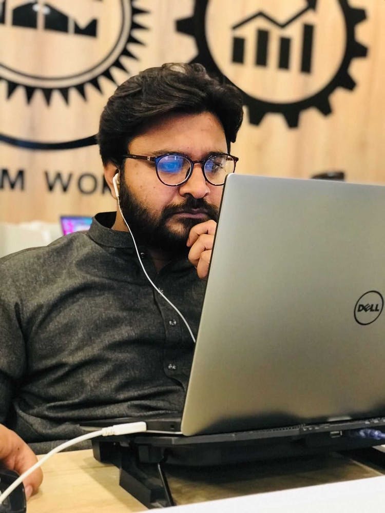 Man Working On Laptop