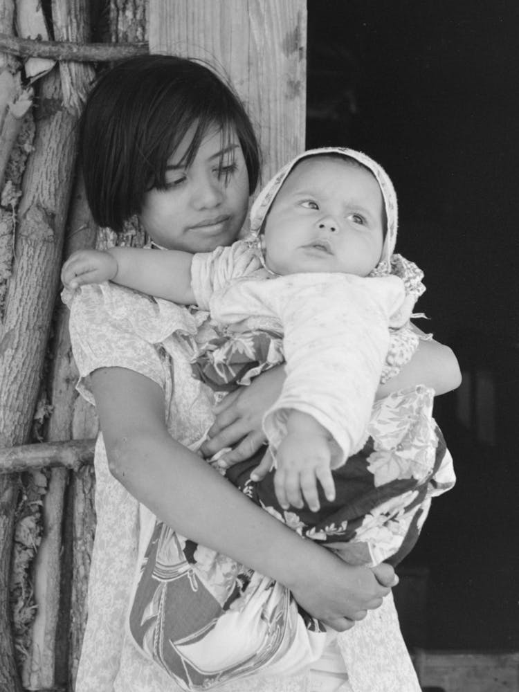 Mexican Girl With Baby Sister In Front Of Hut Near Santa Maria, Texas By Russell Lee