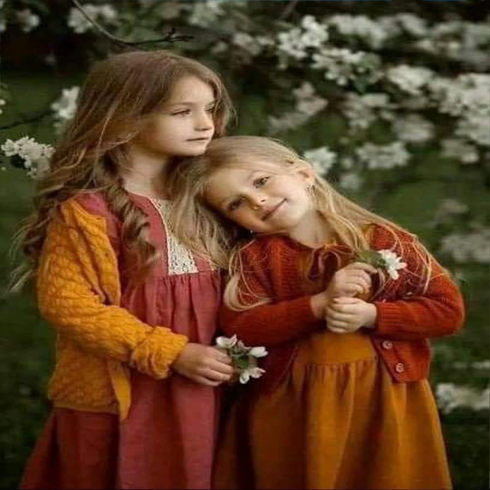 Two Little Girls Hugging