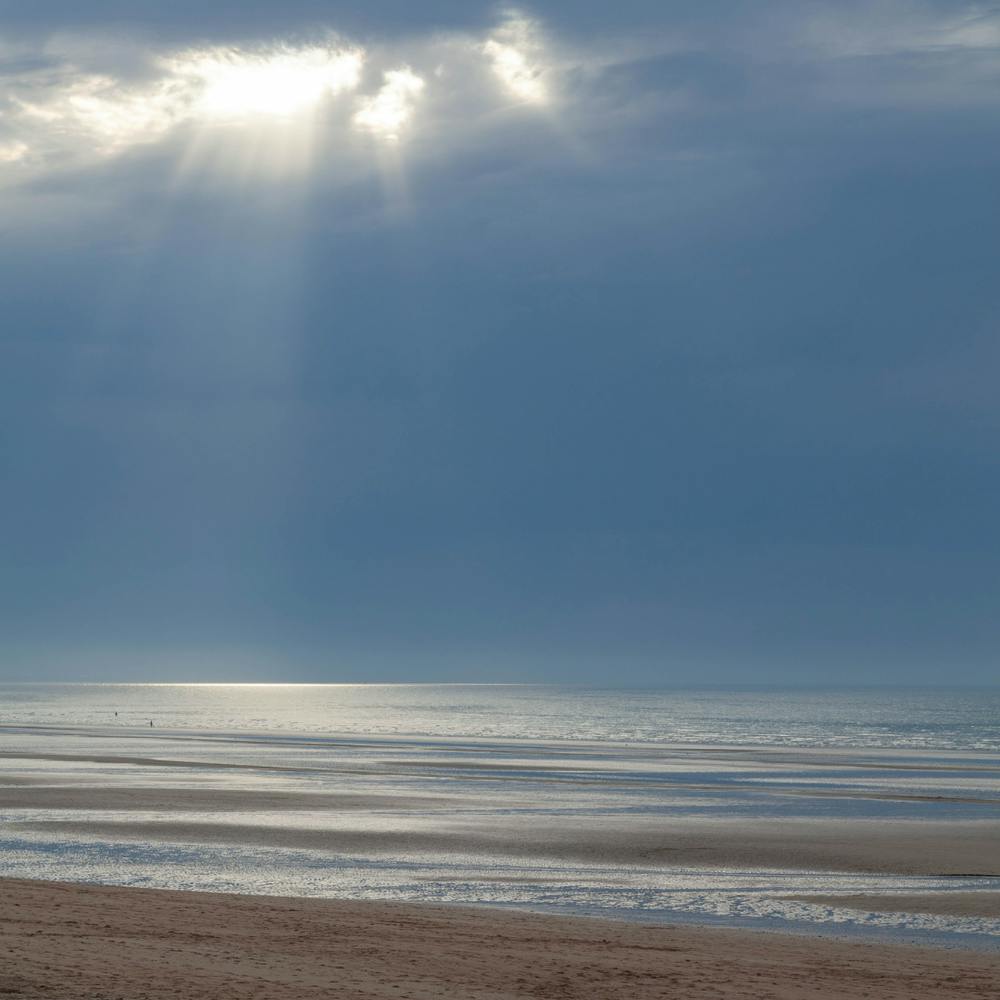Rays Of Light On The Beach