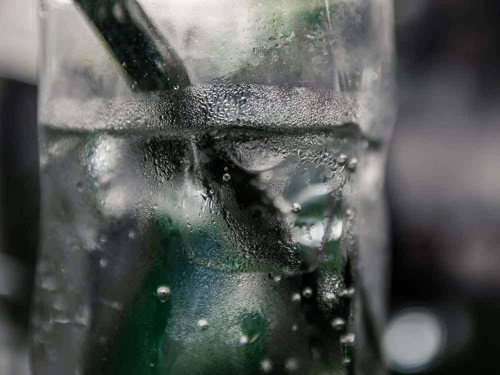 Close Up Of Glass With Sparkling Water In It