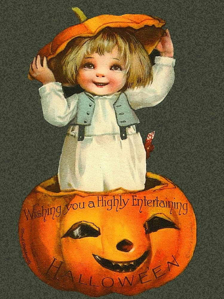 Cute Little Boy Is Coming From A Carved Pumpkin