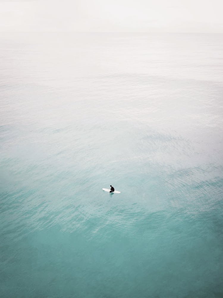 Surfer In Middle Of Ocean