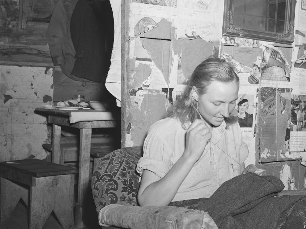 Mrs, Faro Caudill Patching Her Husband S Trousers, Pie Town, New Mexico By Russell Lee