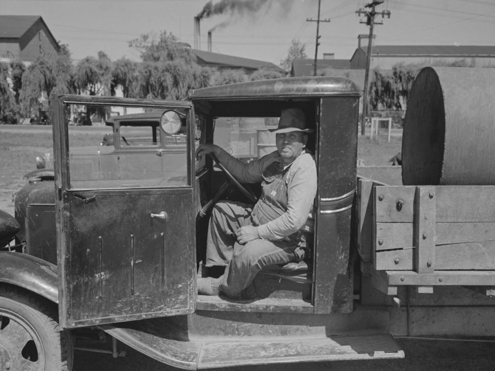 Farmer In Cab Of Truck At Liquid Feed Loading Station At Owensboro, Kentucky By Russell Lee