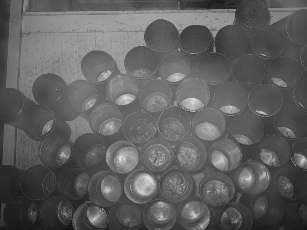 Stack Of Ice Cream Cans, Creamery, San Angelo, Texas By Russell Lee