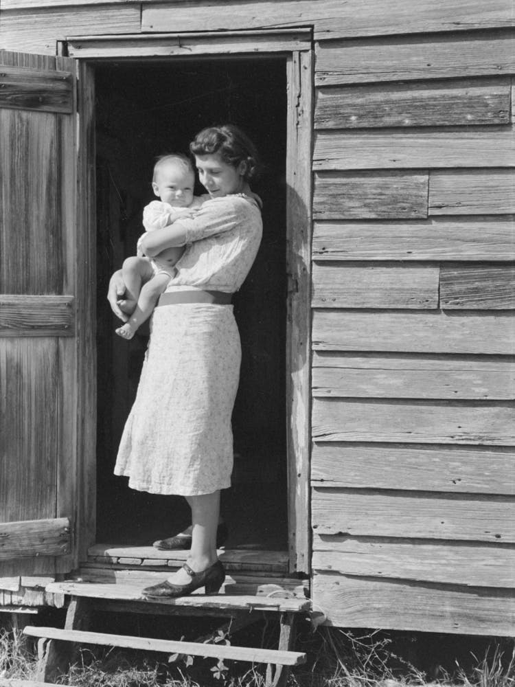 Wife And Child Of Day Laborers, Sugarcane Fields Near New Iberia, Louisiana By Russell Lee