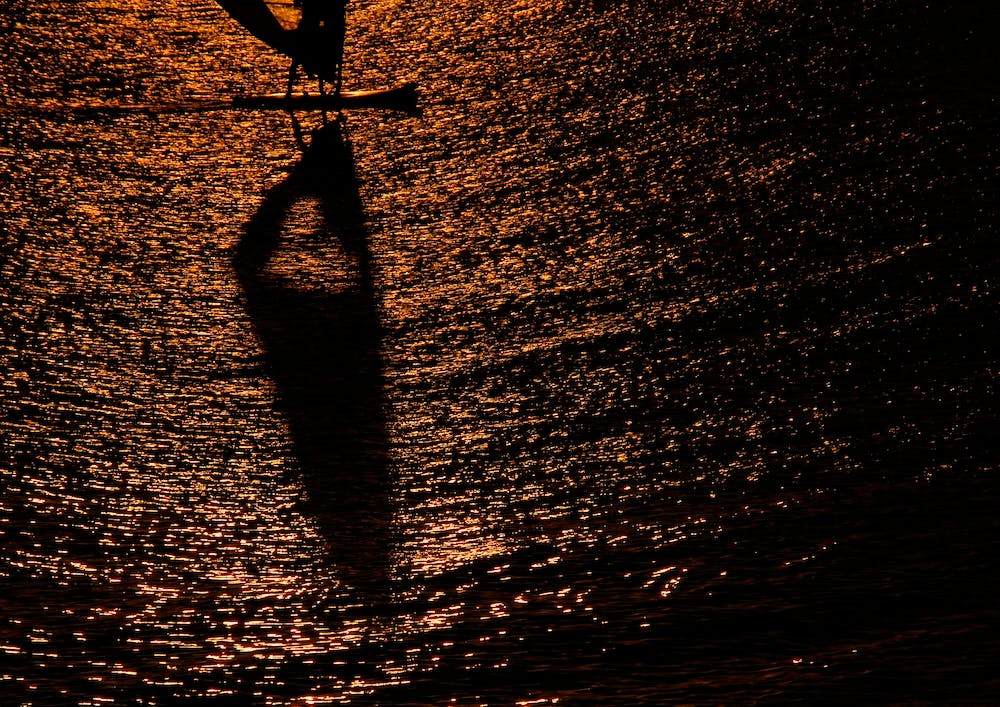 Silhouette Of A Windsurfer