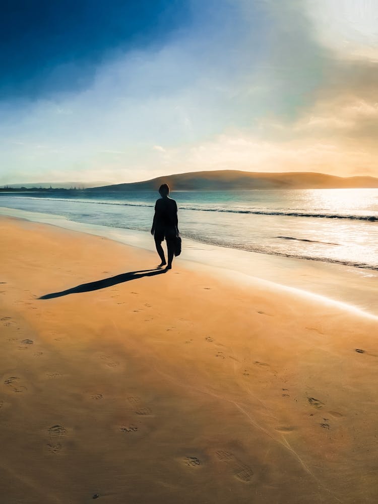 Beach Walk At Sunrise
