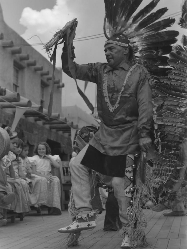 A Member Of The Forest Service Who Is Participating In Indian Dances At The Fiesta, Taos, New Mexico By Russell Lee
