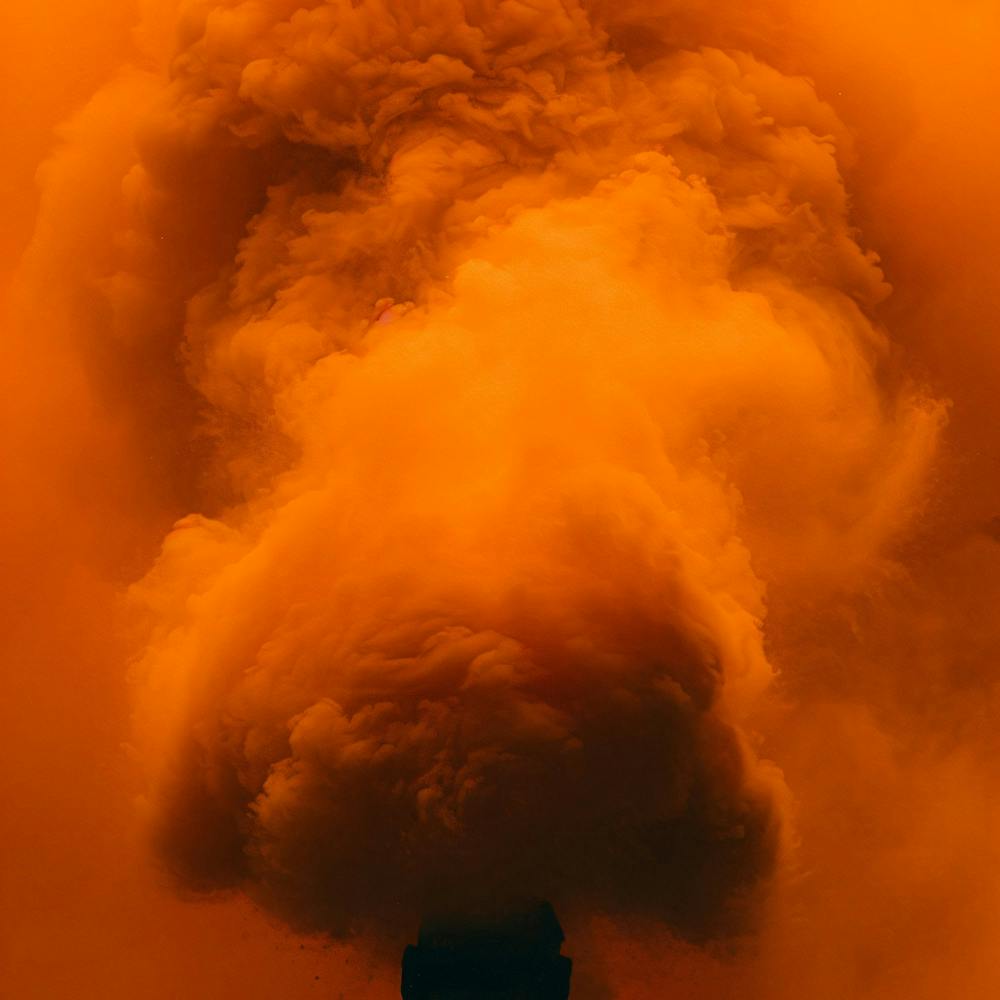 Smoke Billowing From A Chimney