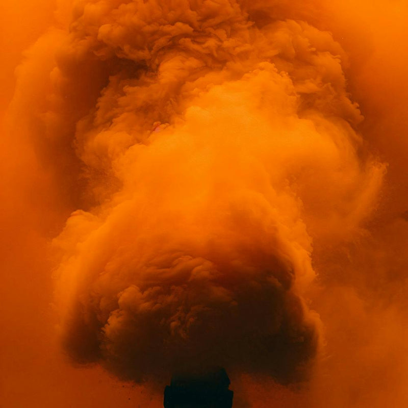 Smoke Billowing From A Chimney