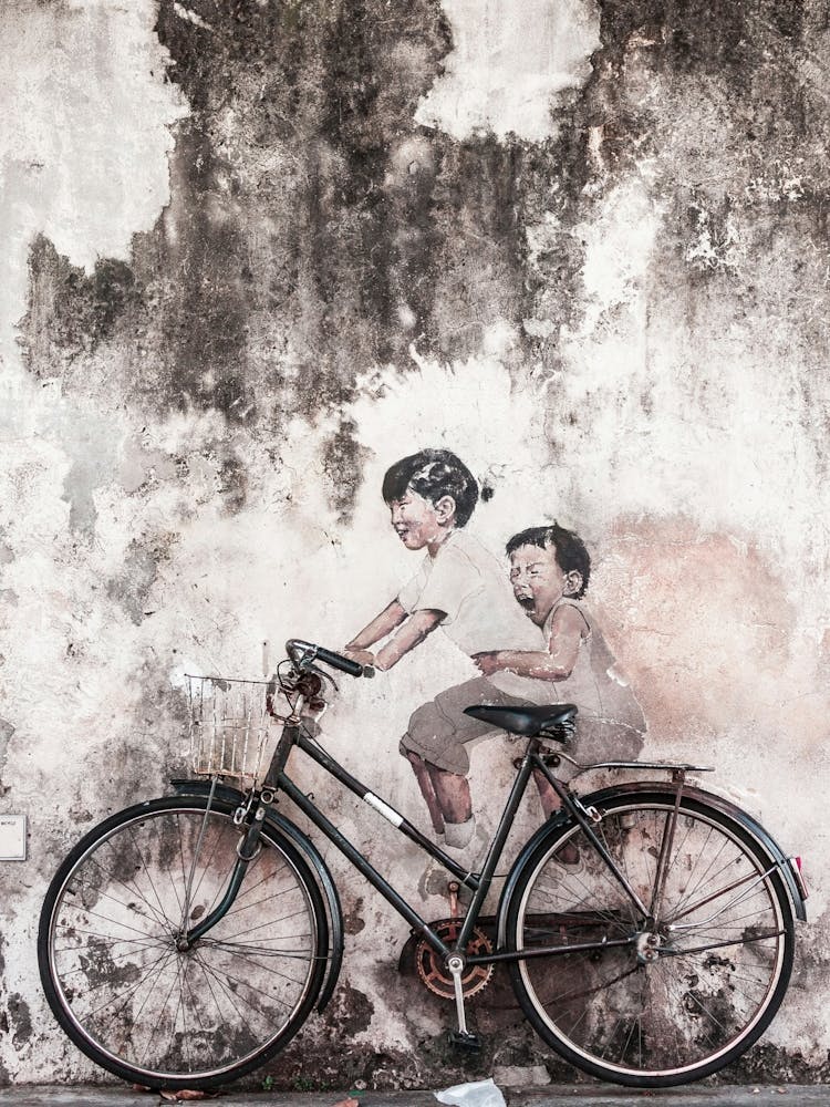 Children On A Bicycle
