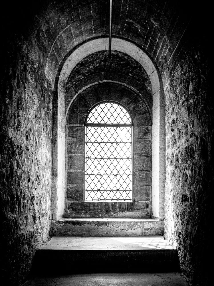 Beautiful light through an old medieval window // London Travel Photography