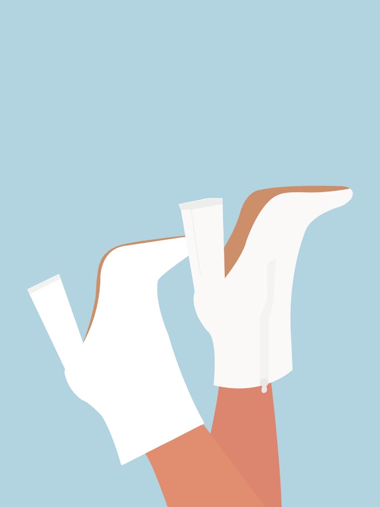 White Fashion Boots on Blue Background