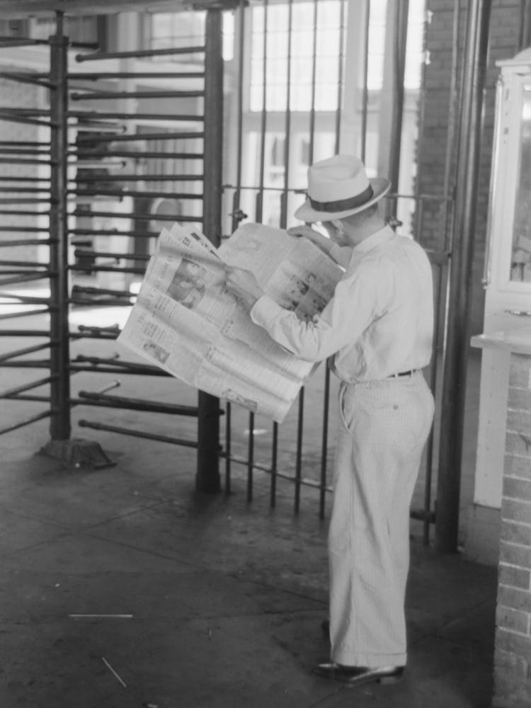 Untitled Photo, Possibly Related To Man Reading Newspaper While Waiting For Streetcar Streetcar Station, Oklahoma