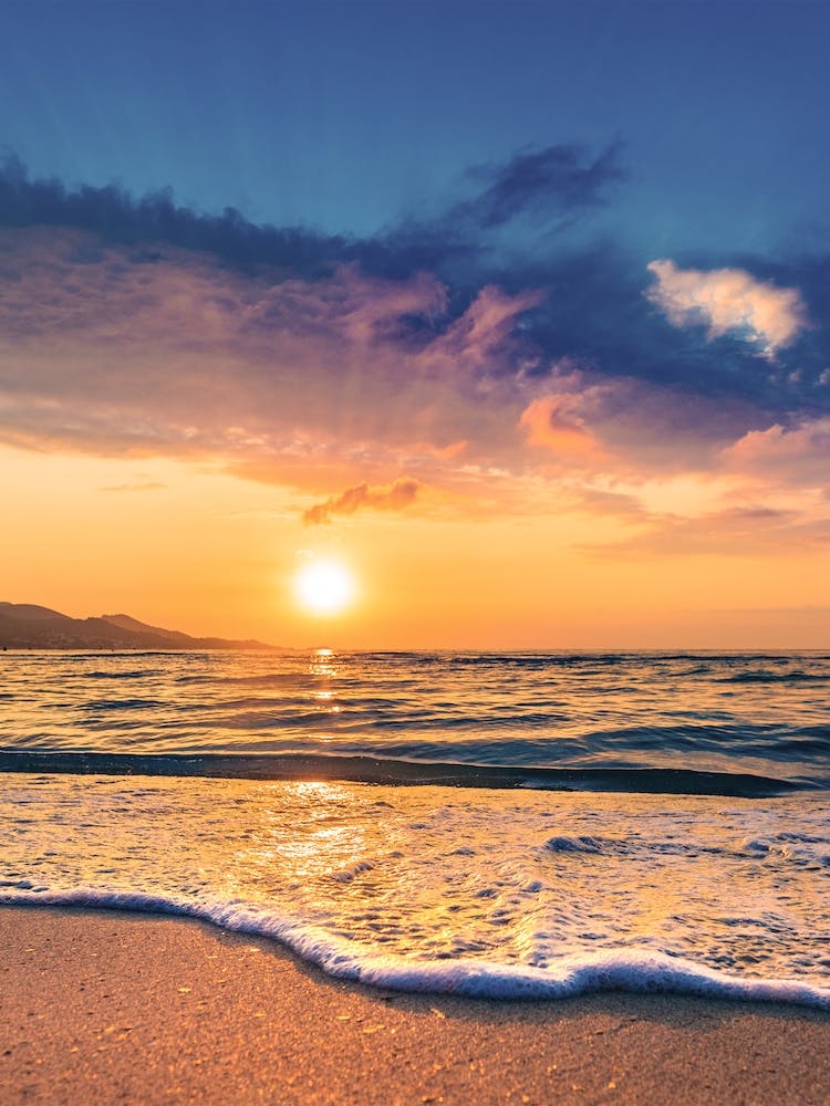 Romantic beach sunset at the coast of Majorca island Spain
