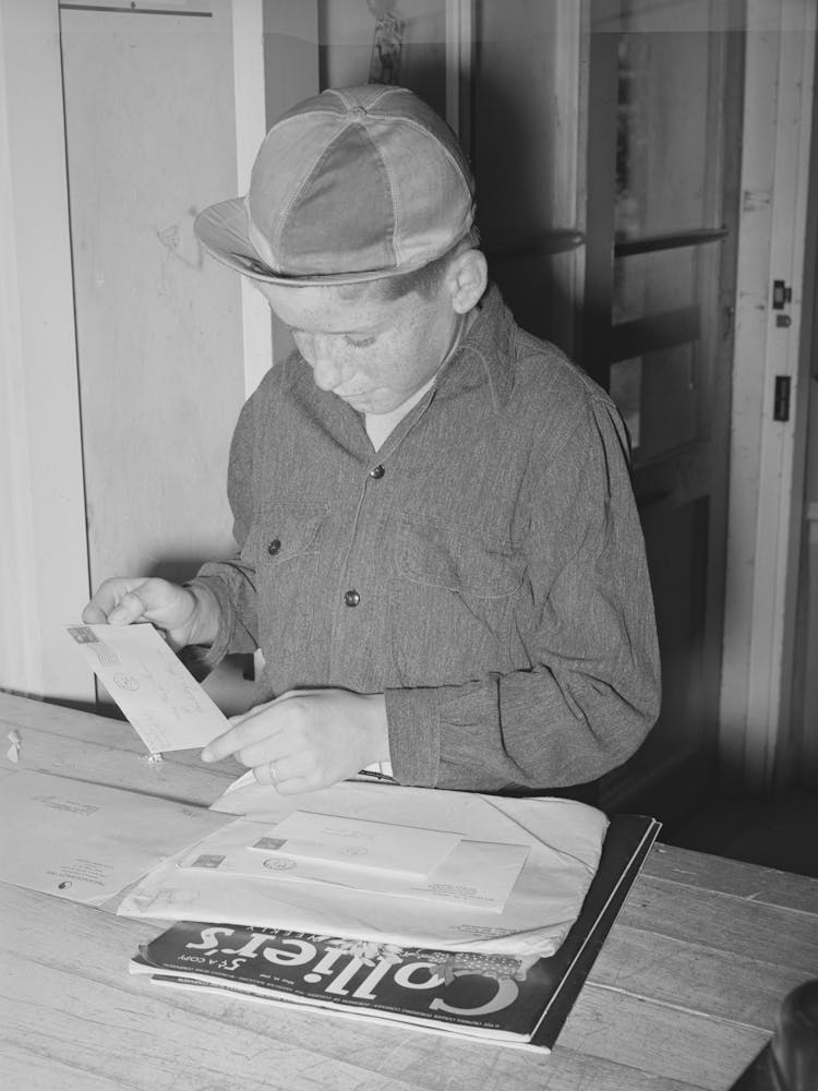 Little Boy Receiving His Family S Mail At The Post Office Of The Casa Grande Valley Farms, Pinal County, Arizona By Russ