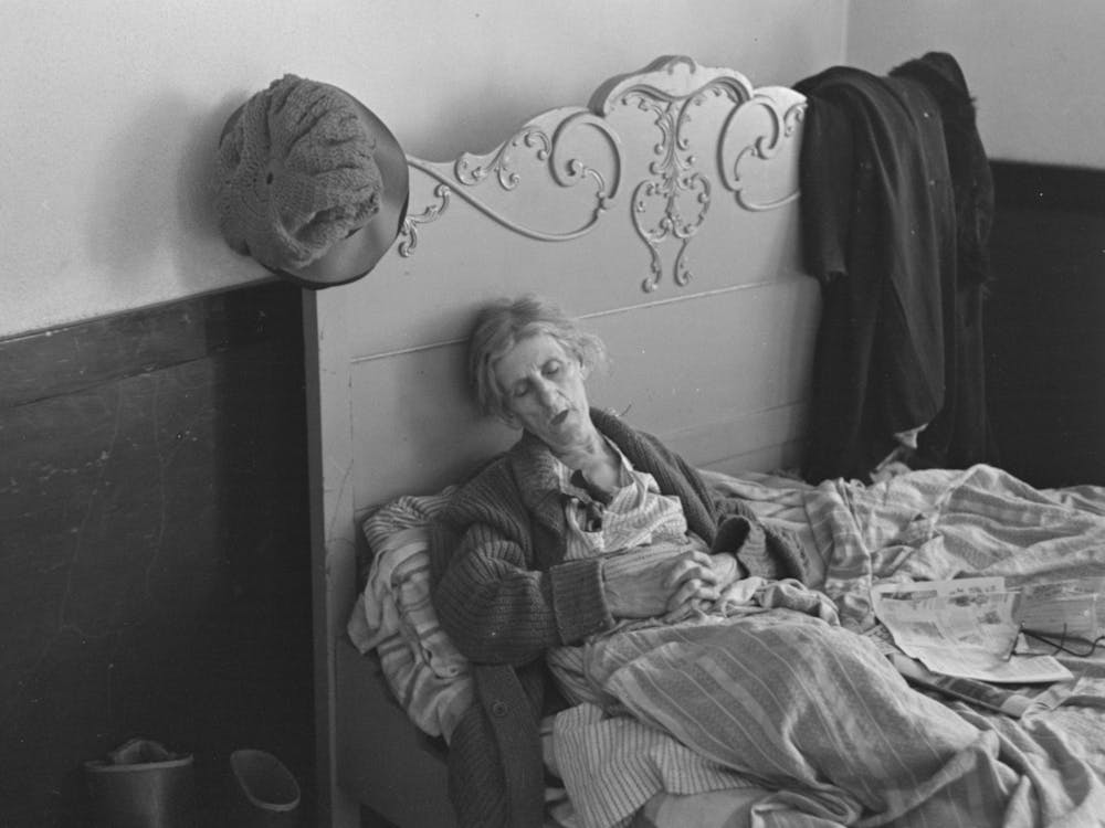 Exhausted Flood Refugee Resting, Sikeston, Missouri By Russell Lee