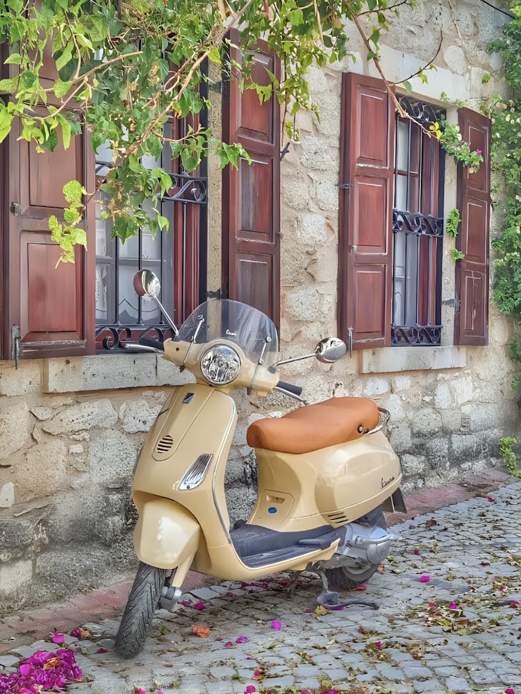Vespa Parked In Front Of A House