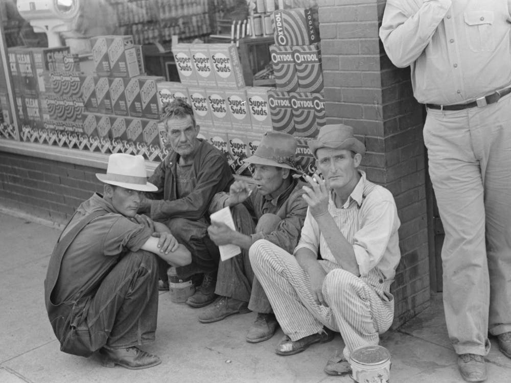 Farmers Squatting On Sidewalk, Caruthersville, Missouri By Russell Lee