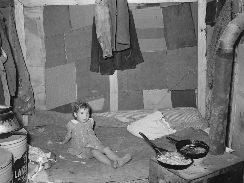 Interior Of Tent Of White Migrant Family Near Edinburg, Texas, Bed Is On The Floor, Tent Was Made Of Patched Cotto