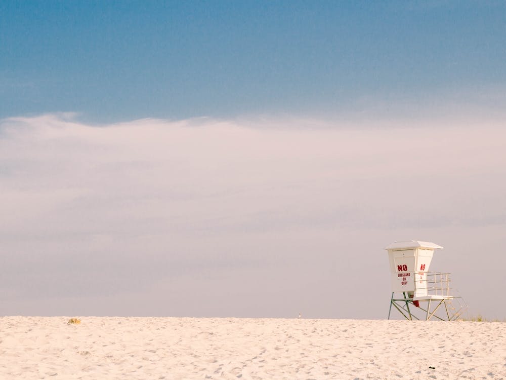 White Lifeguard Station On Beach