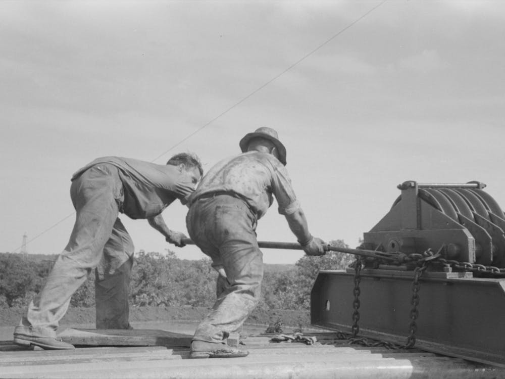Unloading Heavy Equipment From Truck, Seminole Oil Field, Oklahoma By Russell Lee