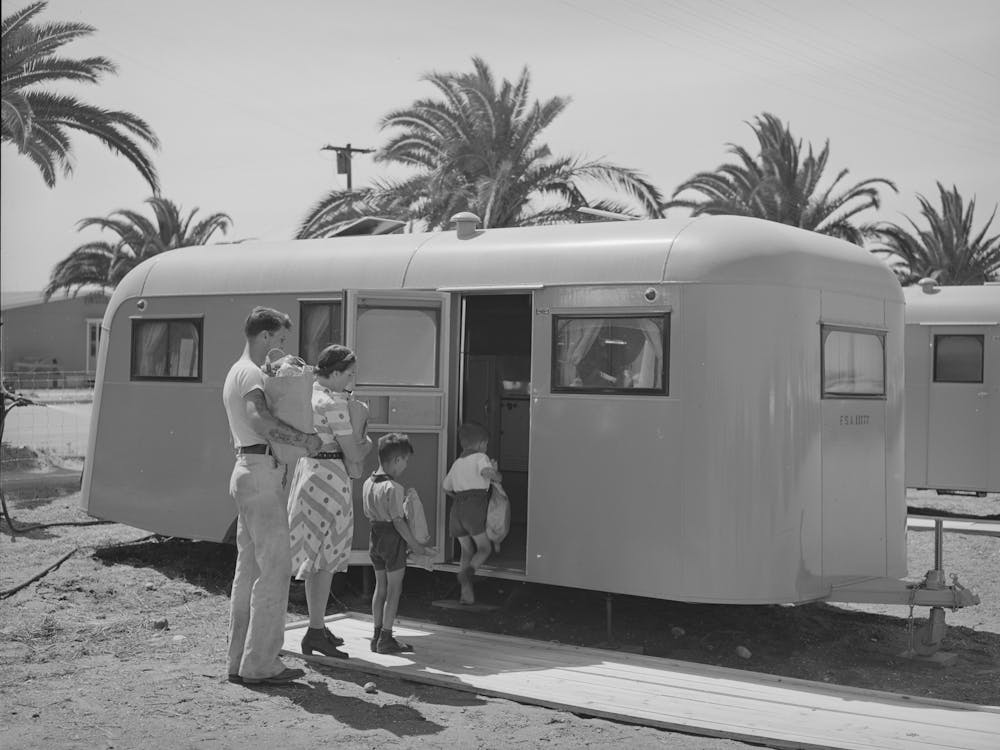 Family Moving Into Trailer At The Fsa (Farm Security Administration) Camp For Defense Workers, This Family Is From