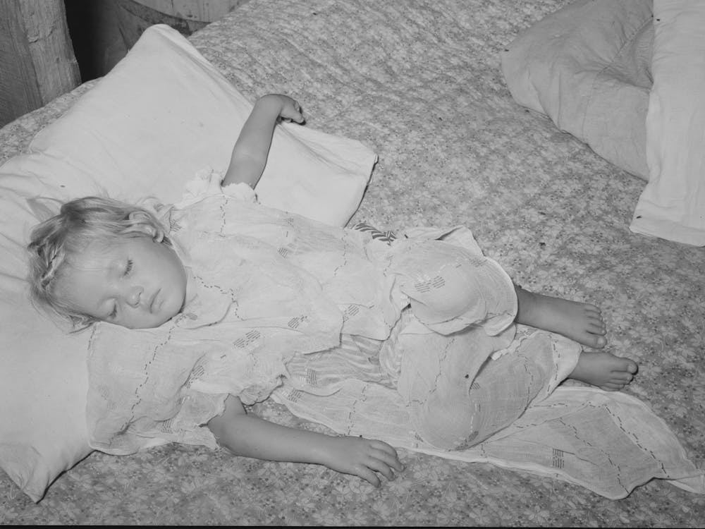 Daughter Of Water Peddler In Community Camp, Oklahoma City, Oklahoma, Asleep, She Is Covered With Old Curtain