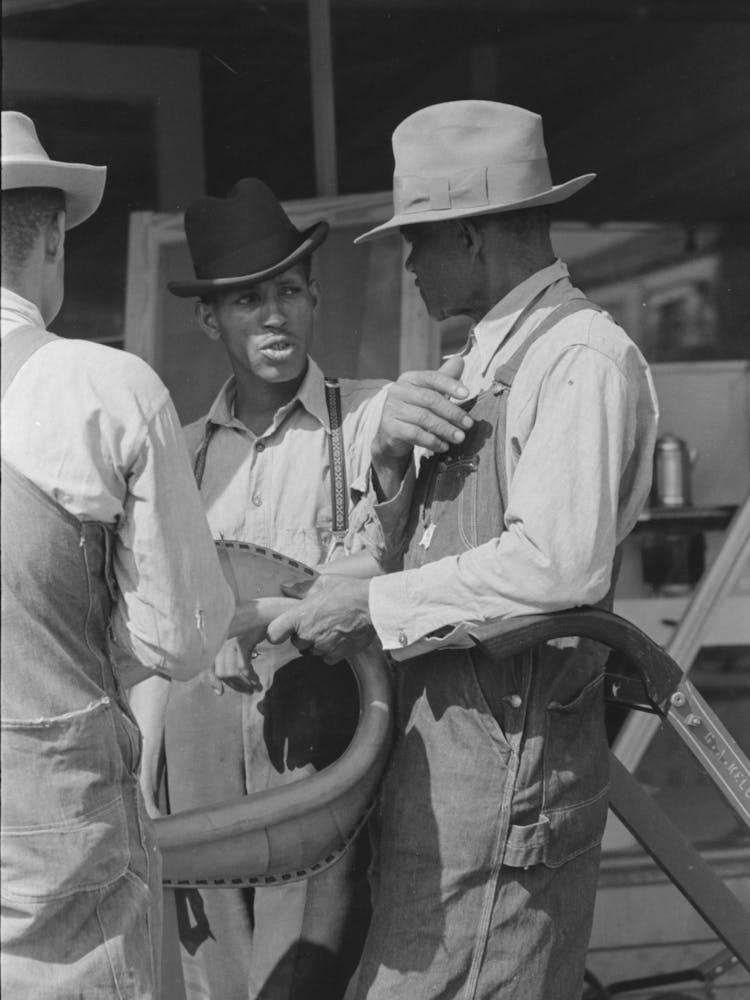 Farmers Talking On The Streets Of San Augustine, Texas By Russell Lee
