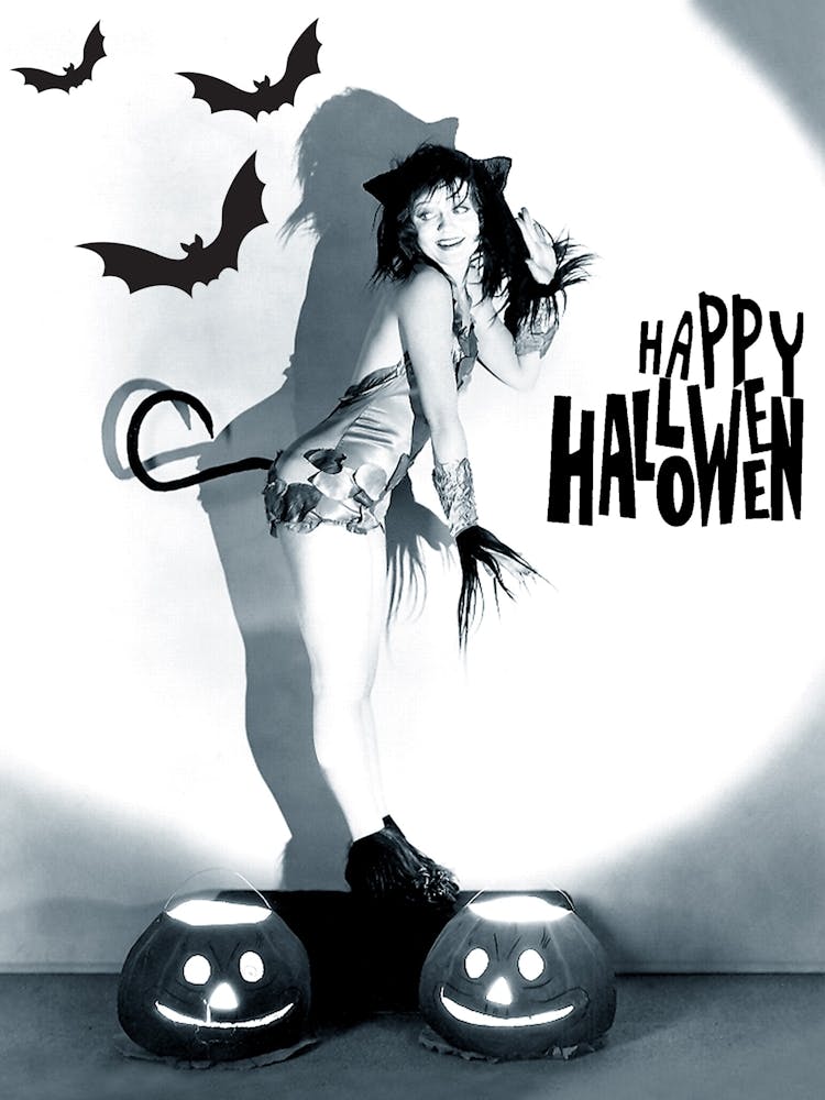 Sexy Pin Up Girl Posing With Bats And Pumpkins