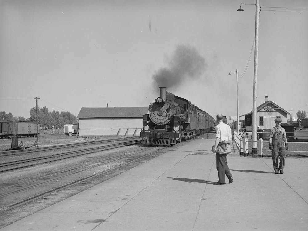 The Morning Train Comes Into Montrose, Colorado By Russell Lee