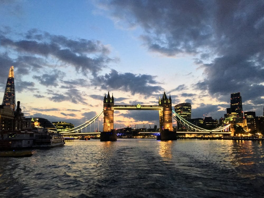 Tower Bridge At Dusk From The River Thames, London  
