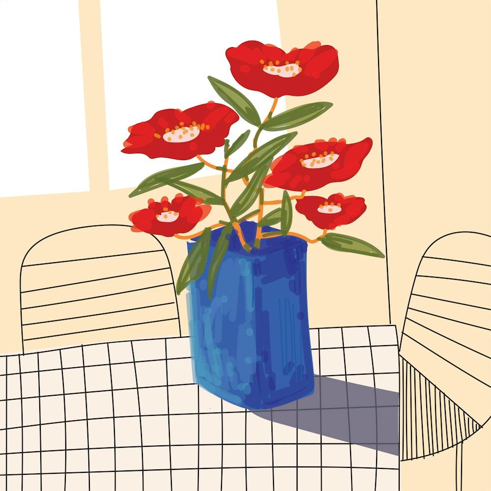 Red Flowers In A Blue Vase