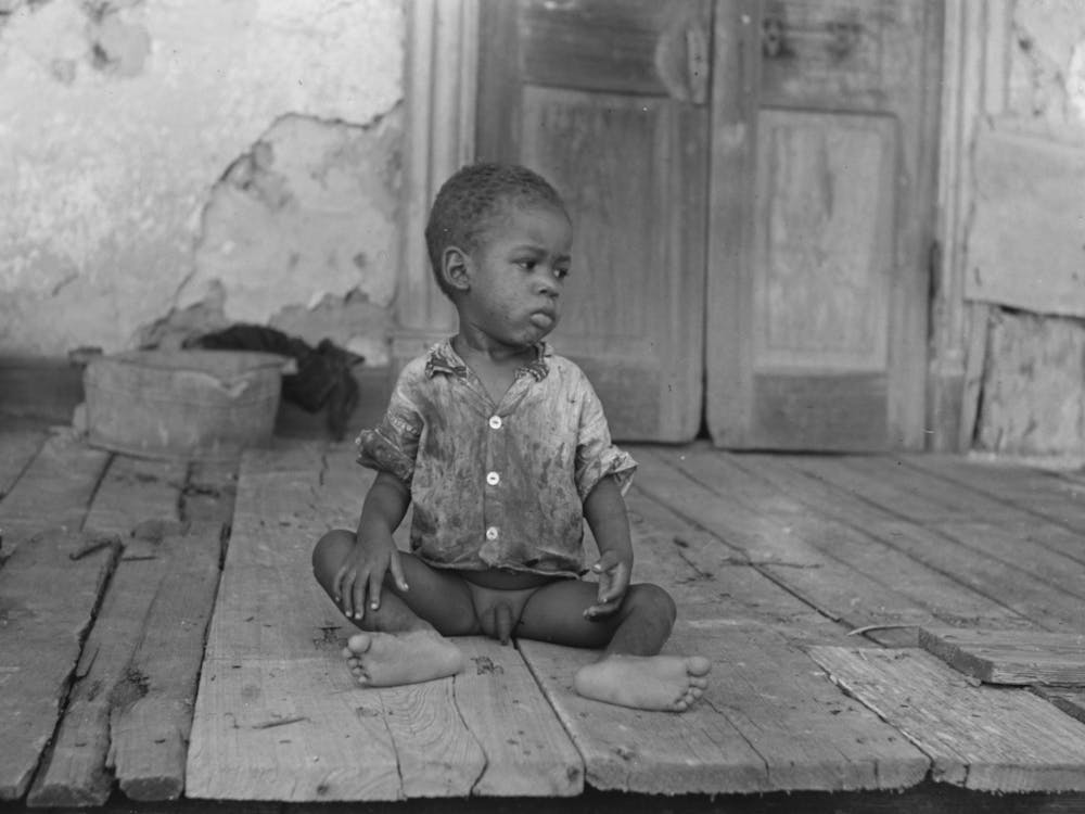Child On Porch Of Dilapidated Trepagnier Plantation Near Norco, Louisiana By Russell Lee
