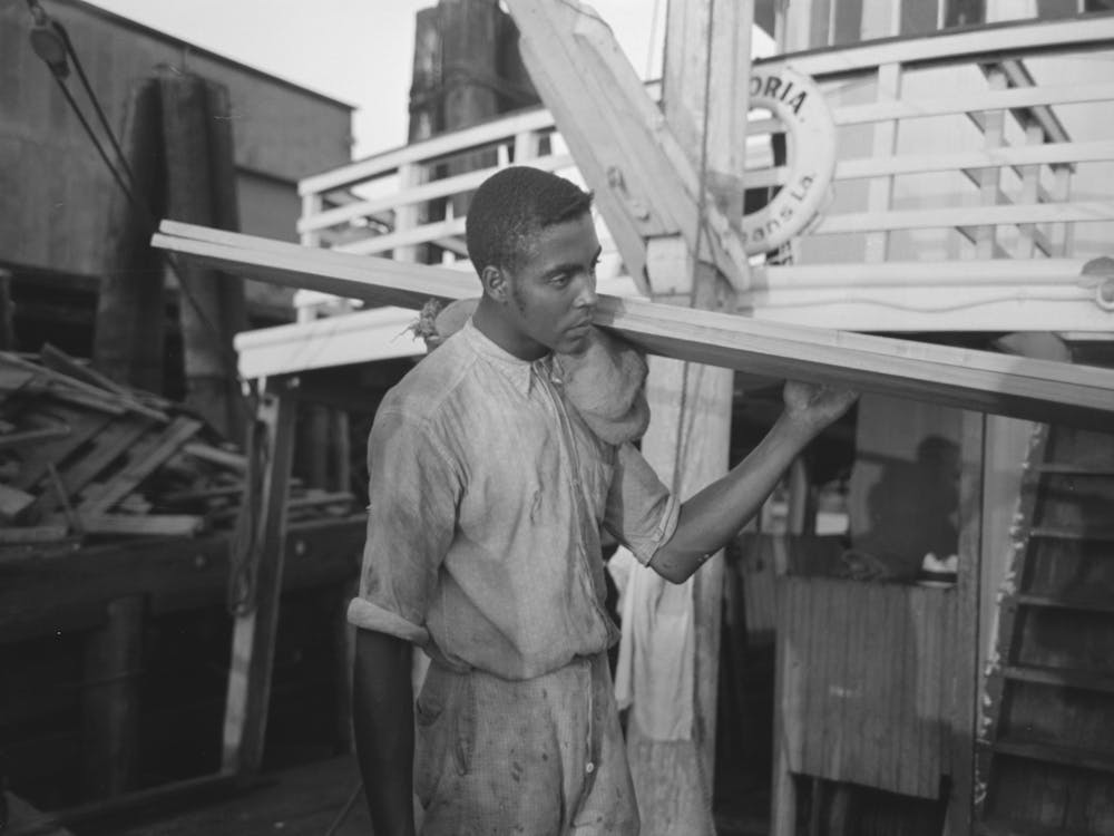 Stevedore, With Lumber On Shoulder, New Orleans, Louisiana By Russell Lee