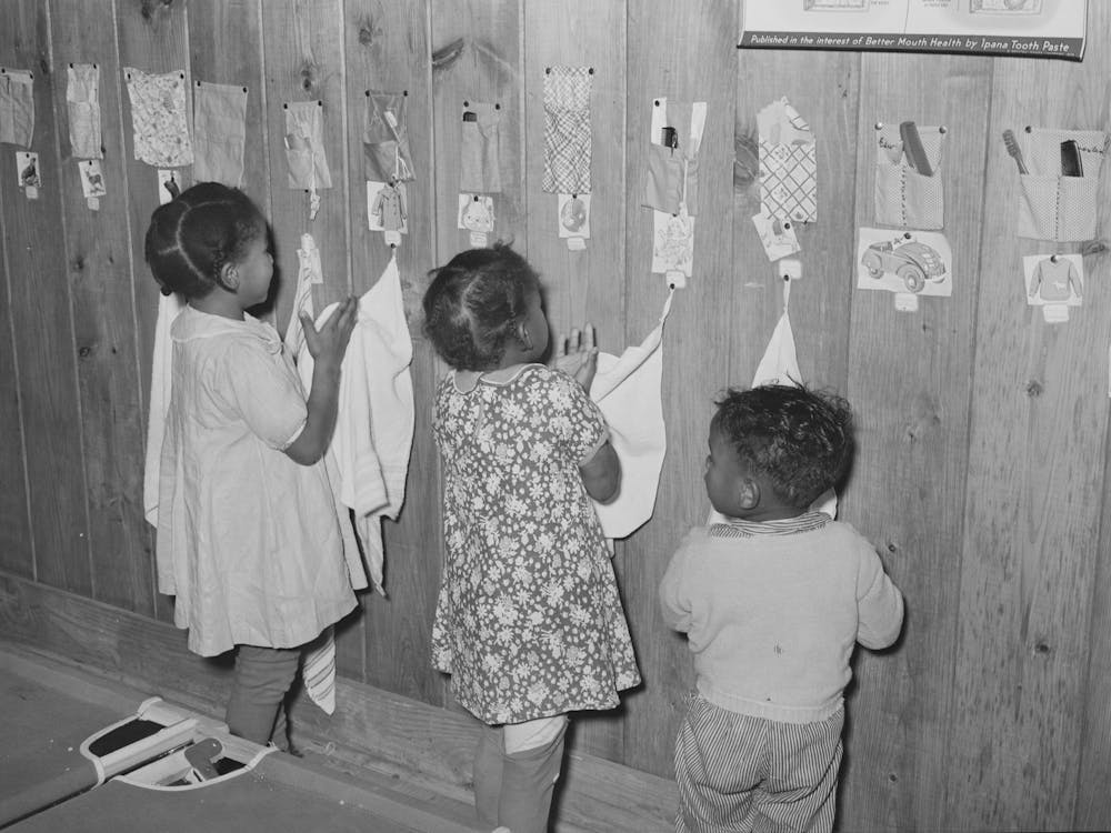Child Wiping Hands After Washing, Lakeview Nursery School,Arkansas By Russell Lee