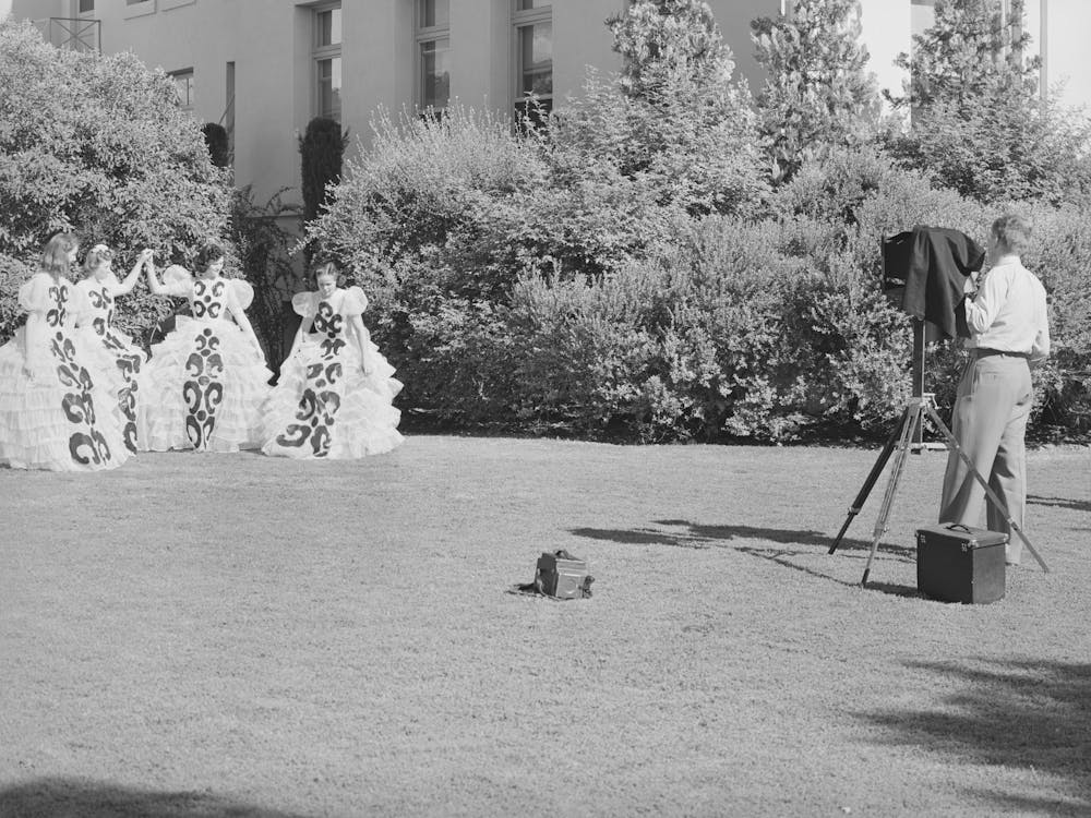 Young High School Girls Being Photographed In Their Graduation Play Costumes, Phoenix, Arizona By Russell