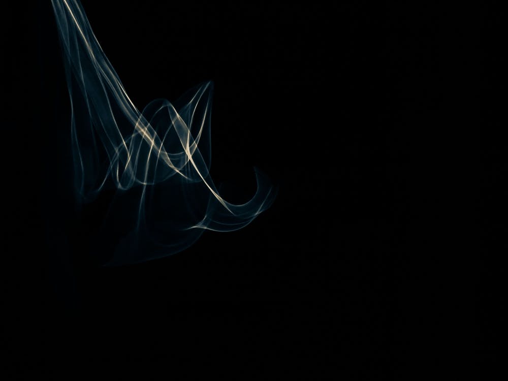 Glowing abstract curved blue and yellow lines