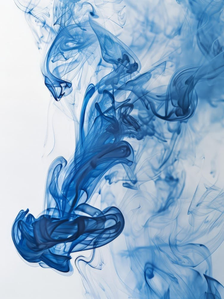 Blue Ink Smoke On White Background Photo