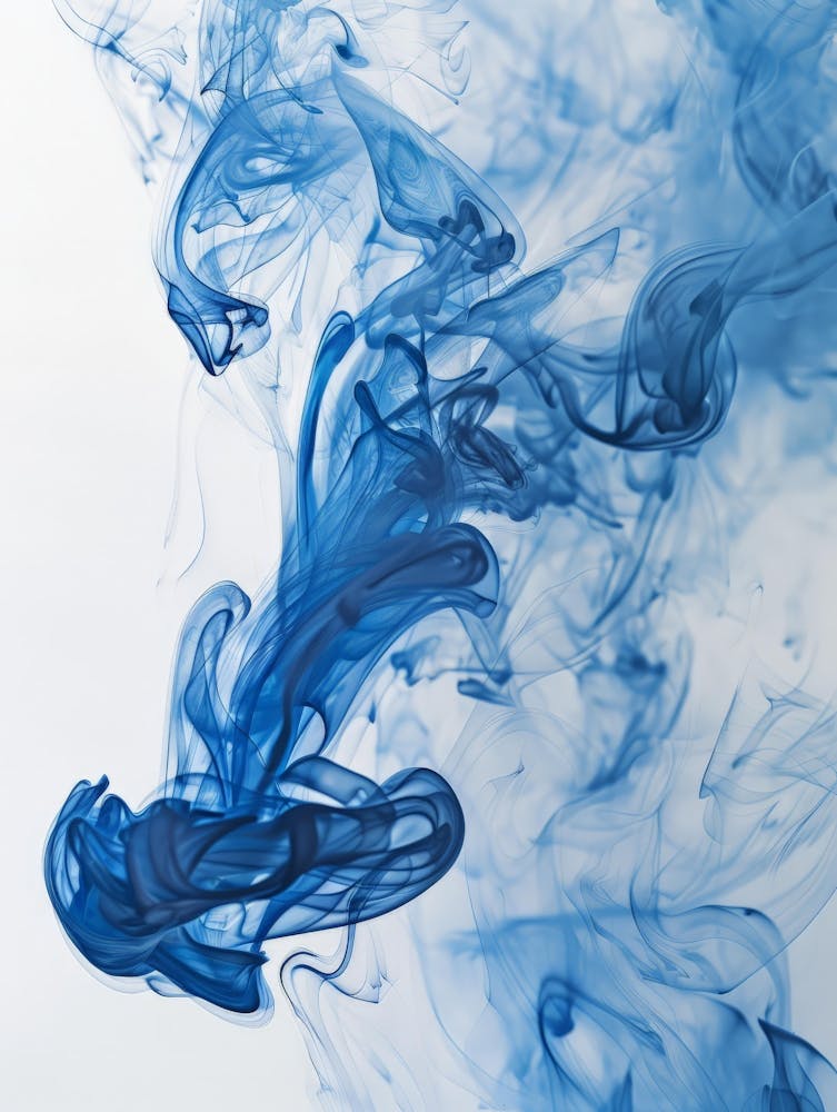 Blue Ink Smoke On White Background Photo